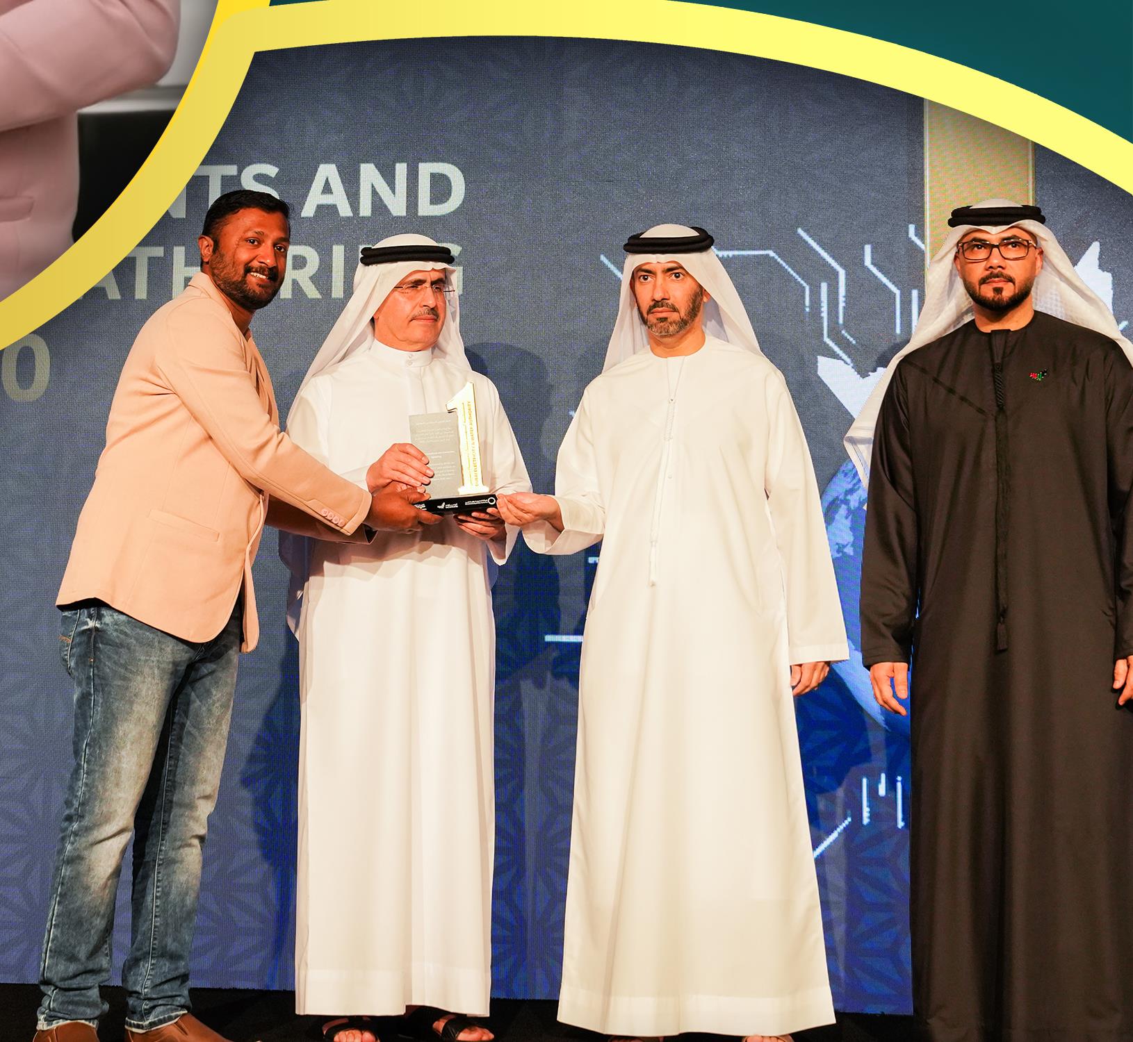 H.E. Saeed Mohammed Al Tayer presenting DEWA Award to Al Hashimi Electrical Installation Works